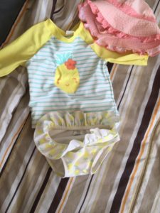 Swimsuit and Hat- Conquering the Beach with a Toddler- Corpus Christi Moms Blog