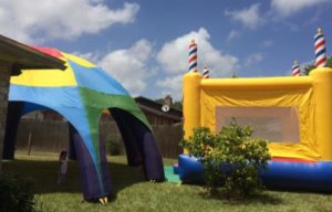Bounce House- How to throw a birthday party for multiple children- Corpus Christi Moms Blog