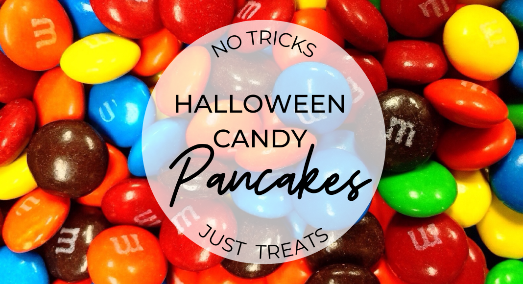 Background of image shows an assortment of M&M candies, the overlay text reads: No Tricks, Just treats: Halloween Candy Pancakes