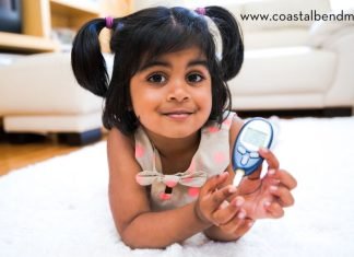 Little Girl with a Blood Sugar reader