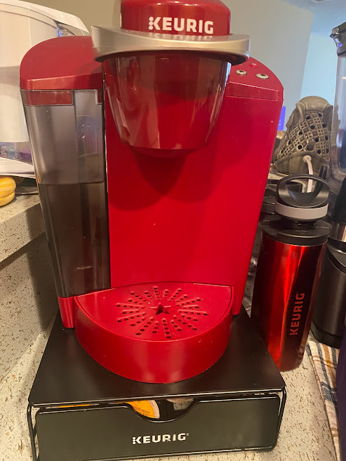 Image of a red Keurig coffee maker. 