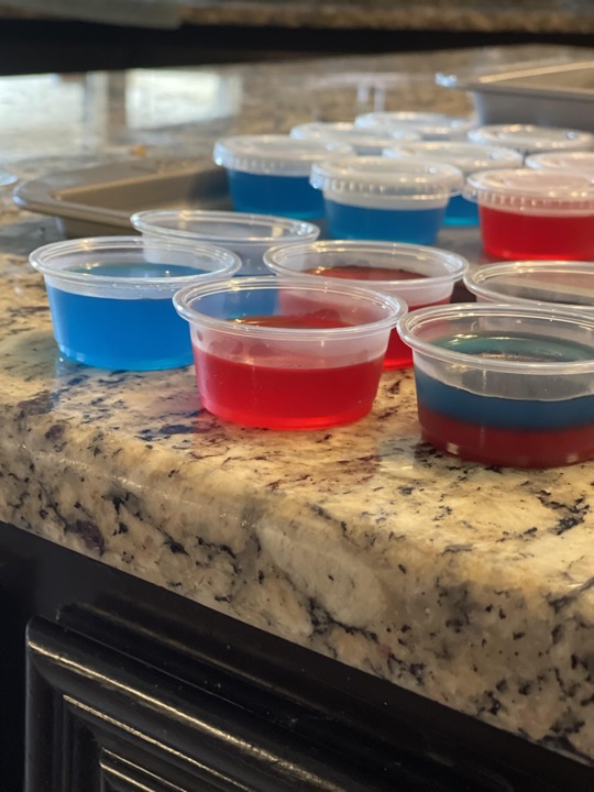 Blue and Red Jello Shots on the counter