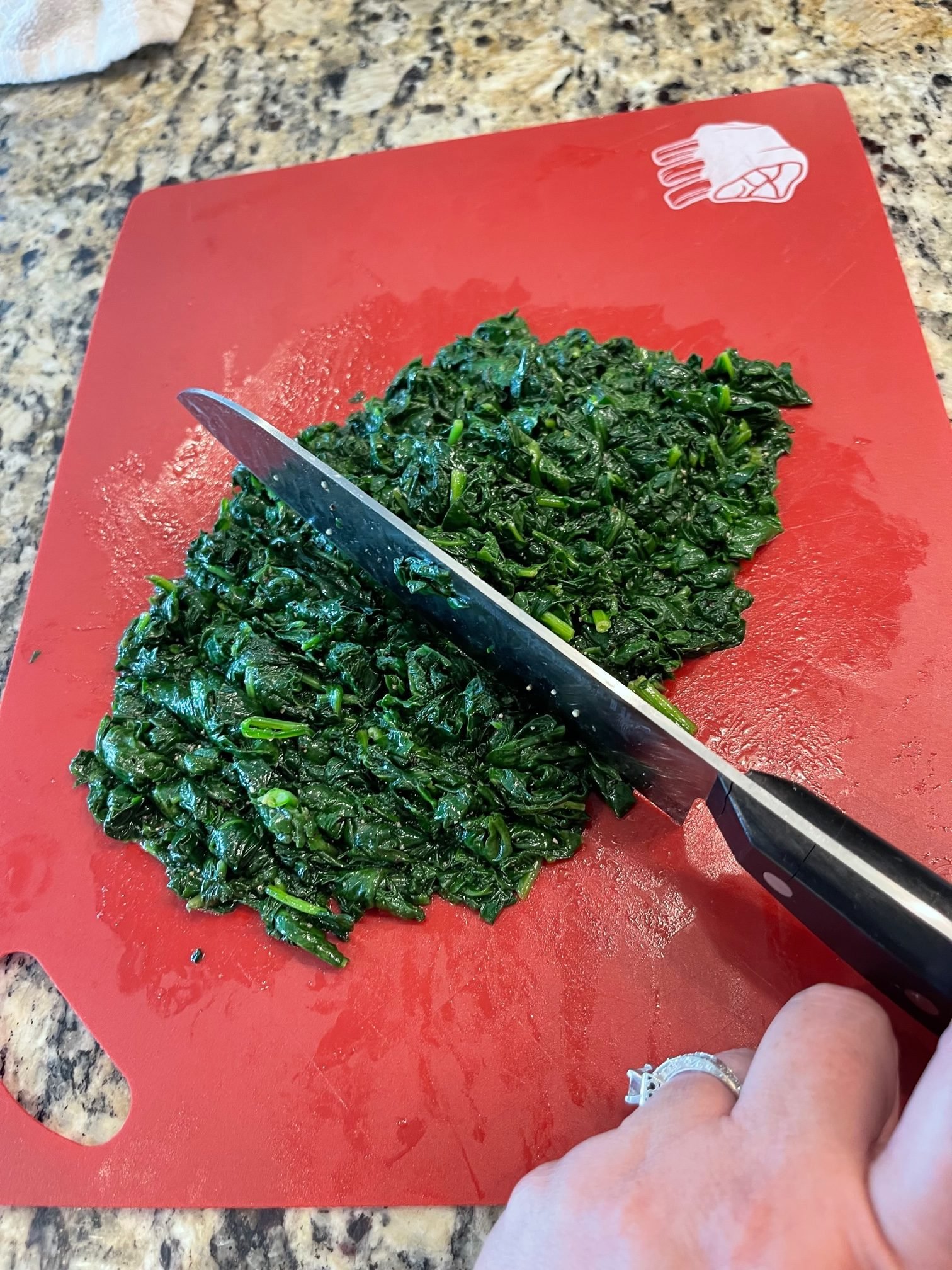 Finely chop the cooked spinach