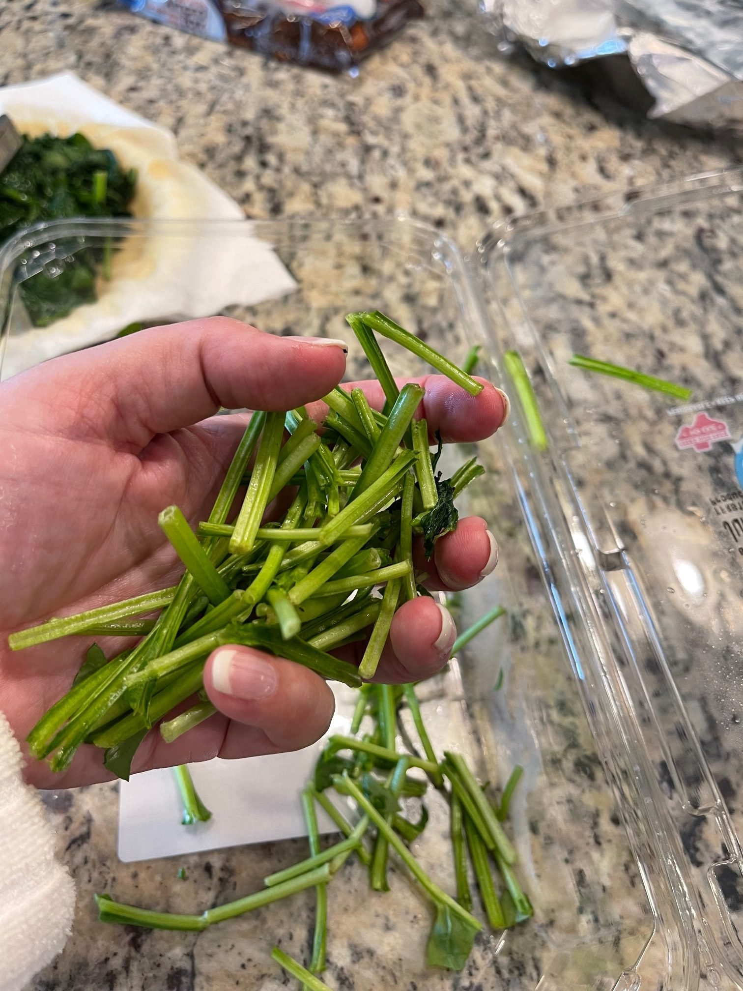 Handful of stems cut off of the spinach leaves before cooking